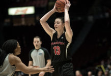 Marlee Ball celebrates her senior night and leads Ravens on the court