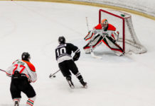 Men’s hockey team snaps program record