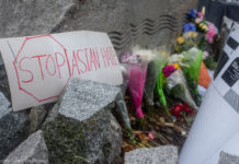 In Photos: Vigil held in wake of Atlanta mass shooting