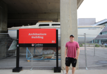 Carleton architecture student repairs sailboat on campus