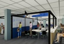 Carleton announces $2 million learning lab project A rendered image of the Future Learning Lab showing some students sitting a table and others writing on a whiteboard.