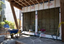 Carleton students target food insecurity with community pantry Photo of a food pantry in construction on 415 MacLaren Street.