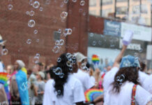 In Photos: Capital Pride Parade brings community together Participants march down Laurier Ave. celebrating Capital Pride.