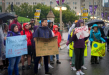 In Photos: Dozens march for migrant worker rights in downtown Ottawa Migrante Ottawa protestors advocating undocumented migrant worker rights