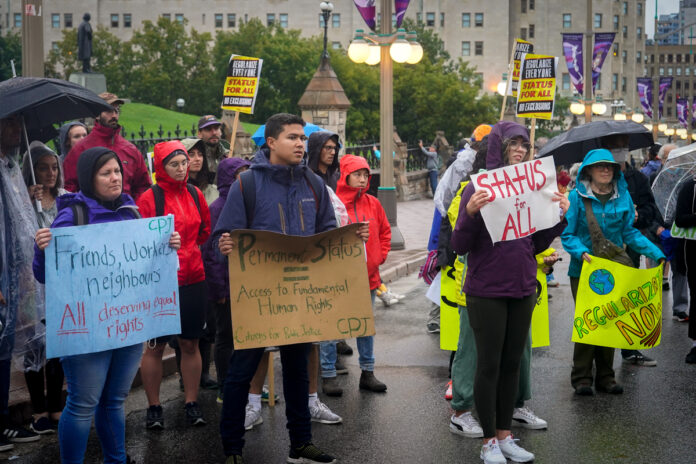 Migrante Ottawa protestors advocating undocumented migrant worker rights