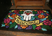 Welcome Back Project invites Ottawans back to their communities with doormat art crawl A colourful doormat is pictured on a doorstep, as part of the Welcome Back Project.