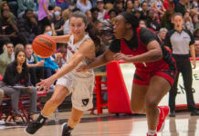 Ravens women’s basketball takes first place after thrashing Algoma
