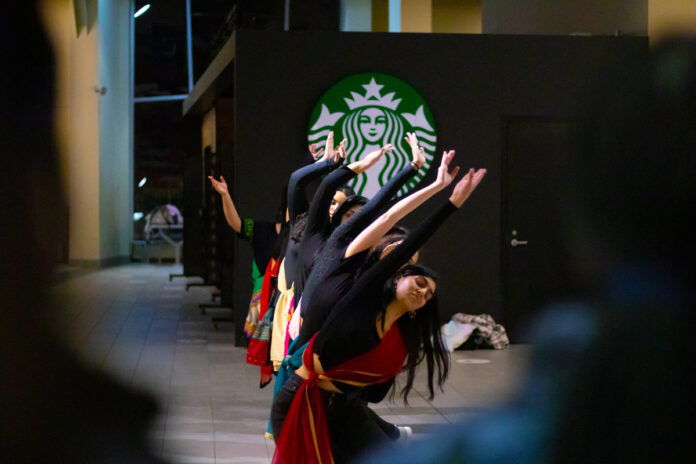Bollywood dancers dance in the UC Atrium for the Cultural Showcase.