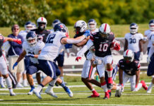 Ravens football dominate Varsity Blues ahead of Panda Game