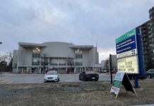 ‘We need more permanent solutions’: City councillor questions use of community centres as emergency shelters Heron Road Community Centre on a cloudy day