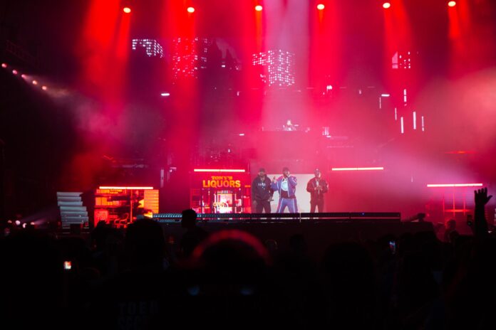 Ottawa Bluesfest headliner 50 Cent raps and ignites the crowd on July 6, 2024. [Photo by Darren Tran/The Charlatan]