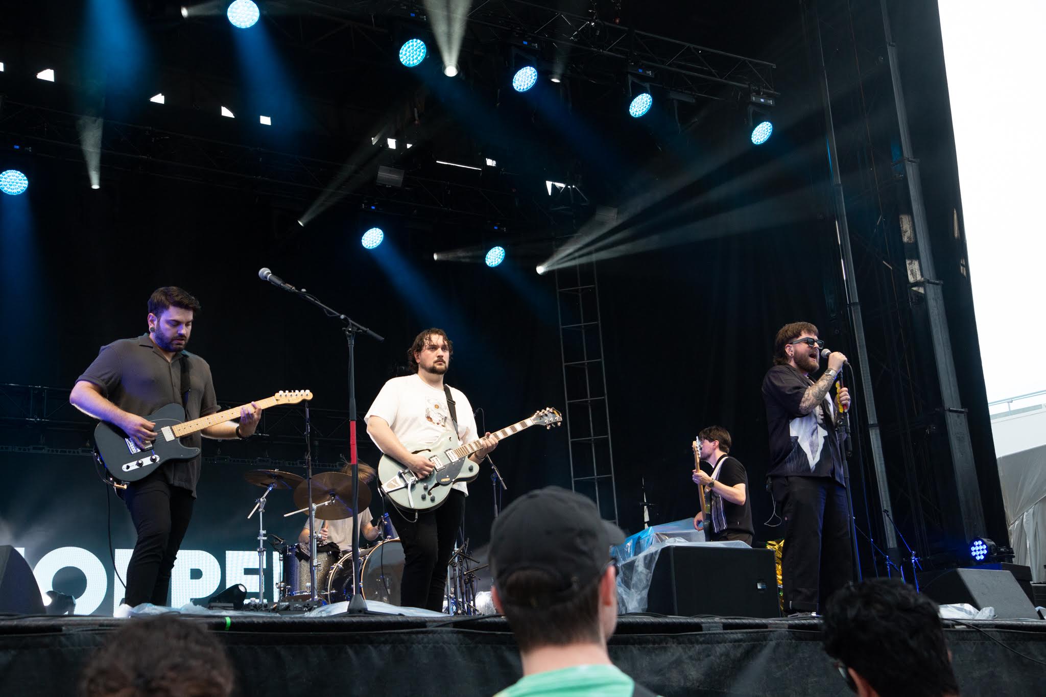 Ottawa-based five-piece Hopper jives and grooves along with the crowd on July 6, 2024. [Photo by Darren Tran/The Charlatan]