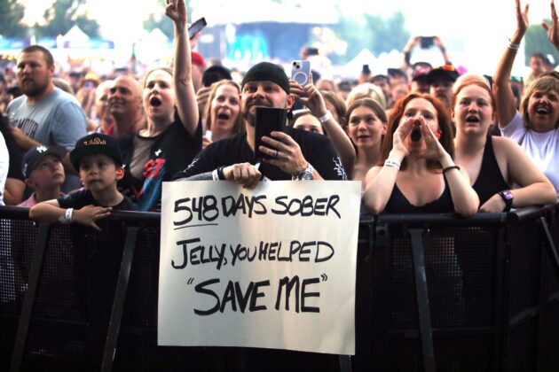 A Jelly Roll fan holds up a sign celebrating their sobriety during the concert on July 9, 2024. [Photo by Wayne Cuddington via Bluesfest]