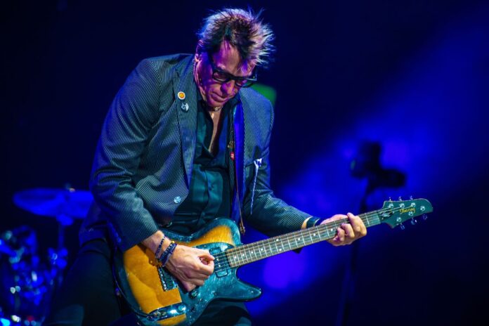 The Offspring lead guitarist Kevin “Noodles” Wasserman plays the guitar at Ottawa Bluesfest on July 11, 2024. [Photo by Sean Sisk via Bluesfest]