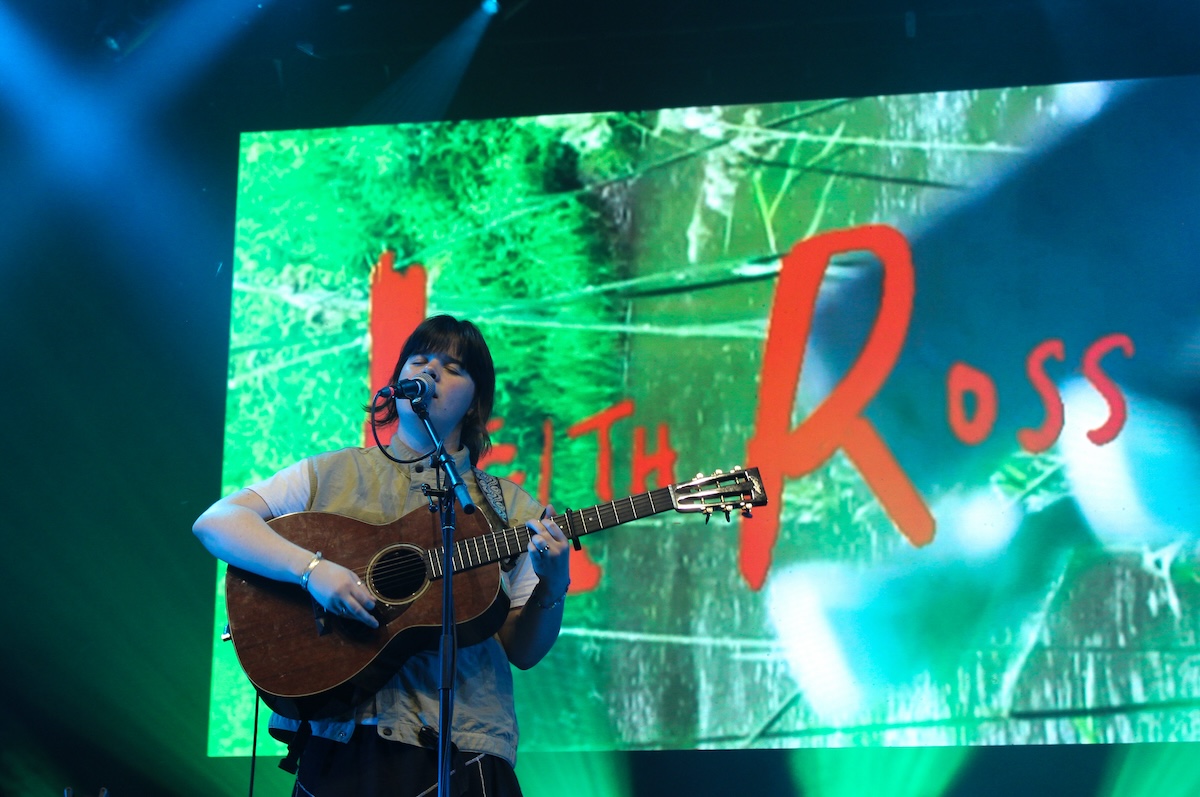 Indie sensation Leith Ross strums the guitar and sings on July 4, 2024. [Photo by Natasha Baldin/The Charlatan]