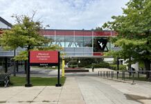Pathway and entrance sign to Carleton University's Physical Recreation Centre building.