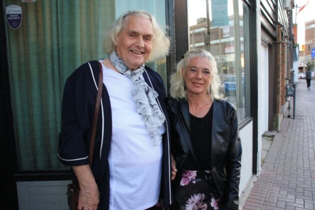 2 women dressed nicely smile on Bank Street