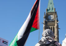 Pro-Palestinian protesters gather to remember, mourn anniversary of conflict