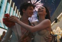 Review: ‘Anora’ is forceful, frenzied and fiercely human A man and a woman wearing white in an embrace with fireworks and lights in the background.