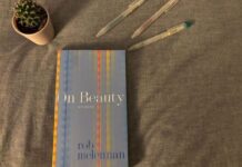 Review: ‘On Beauty’ captures the delicacies of the mundane A blue book with the title "On Beauty" by Rob McLennan sits on a bed. Above it is a cactus and three Muji pens. The backdrop is a gray blanket.