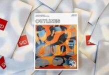 ‘Outlines’ brings a fresh approach to student journalism Amid white papers saying "SID" on it, a orange and blue covered magazine lies in the middle.