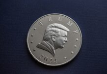 Opinion: If Trump wins again, the damage would be irreparable A 2024 President Donald J. Trump silver coin sits on a simple textured background.