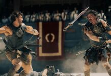 Review: ‘Gladiator II’ is a stellar spectacle of steel, betrayal and revenge Paul Mescal and Pedro Pascal battle it out in 'Gladiator II.' Pedro throws his sword at Paul, and Paul is mid swing back. They are both wearing Roman gladiator armour and skirts.