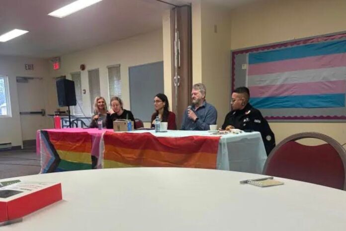 Jodan Drosier (second from right) answers a question about his life experiences as a transgender man surrounded by fellow panelists at the West Side Pride film screening at the Kanata United Church on Nov. 23, 2024.