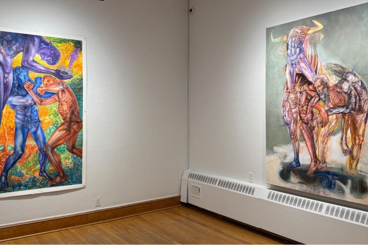 Adrian Gor’s drawing, ‘From the History of Western Narratives: The Making of the Western Soul,’ (left) and his oil painting, ‘The Golden Calf,’ (right) are seen at the Ottawa School of Art on Jan. 18, 2025. The pieces explore themes of cultural identity and the influence of historical and contemporary values. [Photo by Thuy Anh Nguyen/The Charlatan]