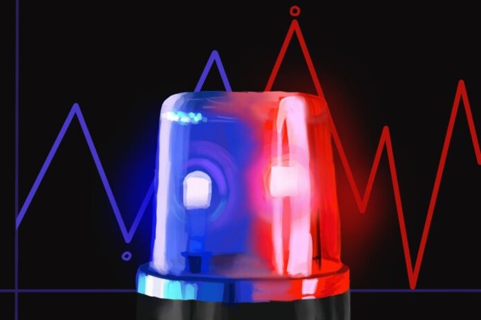 A red and blue police siren with data lines in the background.