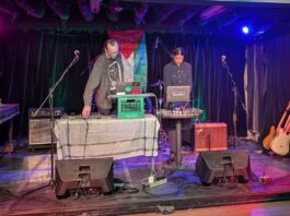 Caption: SUBR musical duo Nicholas LePage (left) and Lougien Dawoudiah (right) perform at Live! On Elgin in a charity concert supporting a community defence fund on Jan. 9, 2025. [Photo by Grace Huntley/The Charlatan]