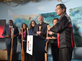 Carleton staff (Duncan McCue, Allan Thompson, Wisdom Tettey) and partners gather at Ojikwanong Indigenous Student Centre to celebrate the launch of a new Indigenous journalism certificate on Jan. 29, 202.