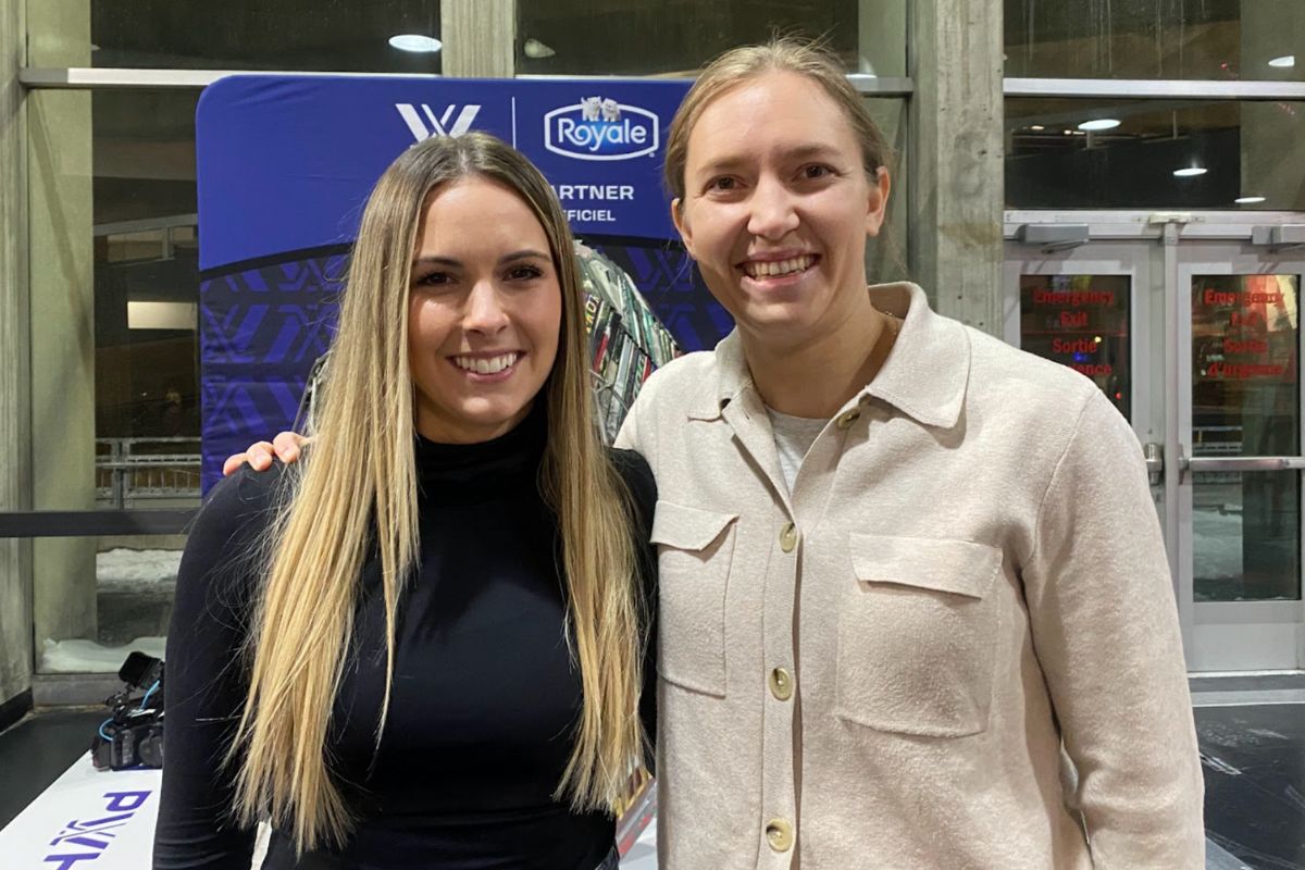 Ottawa Charge teammates Emerance Maschmeyer and Brianne Jenner stand in front of The Inaugural Six sculpture at TD Place. Jenner said she felt “relief” and “real excitement and gratitude” when the PWHL inaugural season was announced in 2023. 