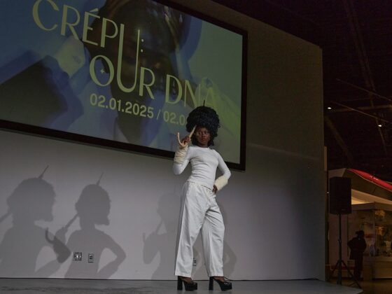 One of DRS Anointed's designs is an umbrella figure, mirroring Rihanna and JAY-Z's song "Umbrella" playing in the background at the Crépu: Our DNA event on Feb. 2, 2025.