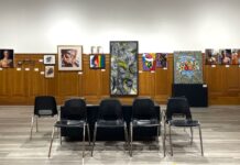 ‘A space to be seen’: Pride Art Exhibit showcases first-time queer artists 6 paintings hung on wall.
