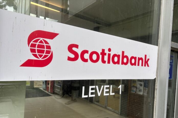 A white sign with a globe symbol in the middle of the letter 