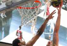 Zane Waterman returns with 36 points to lift BlackJacks over Shooting Stars Player (Zane Waterman) lifts basketball in the air to make a layup with another player reaching across to try and block the shot.