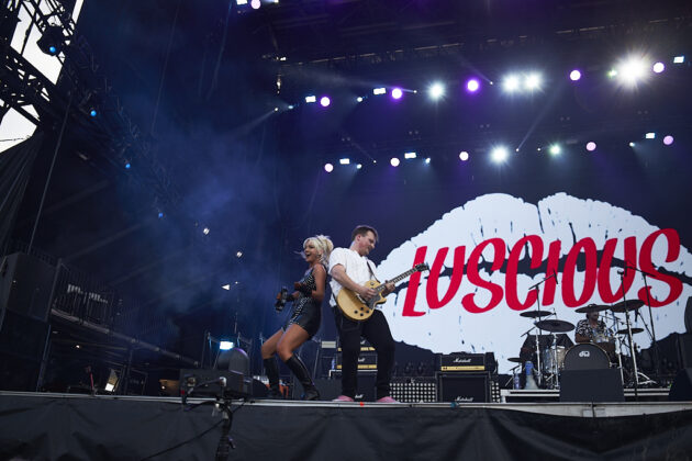 A band performs on a stage.