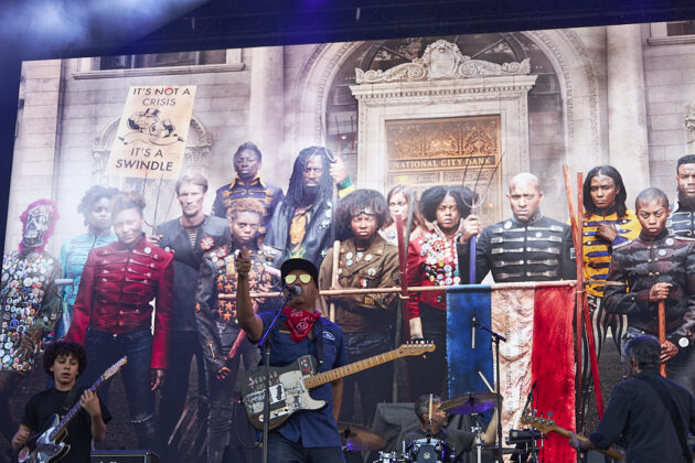 A band performs on a stage.