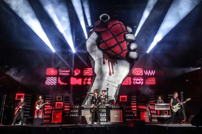 A band performs on stage.