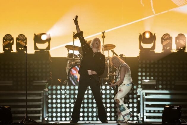 A band performs on stage.