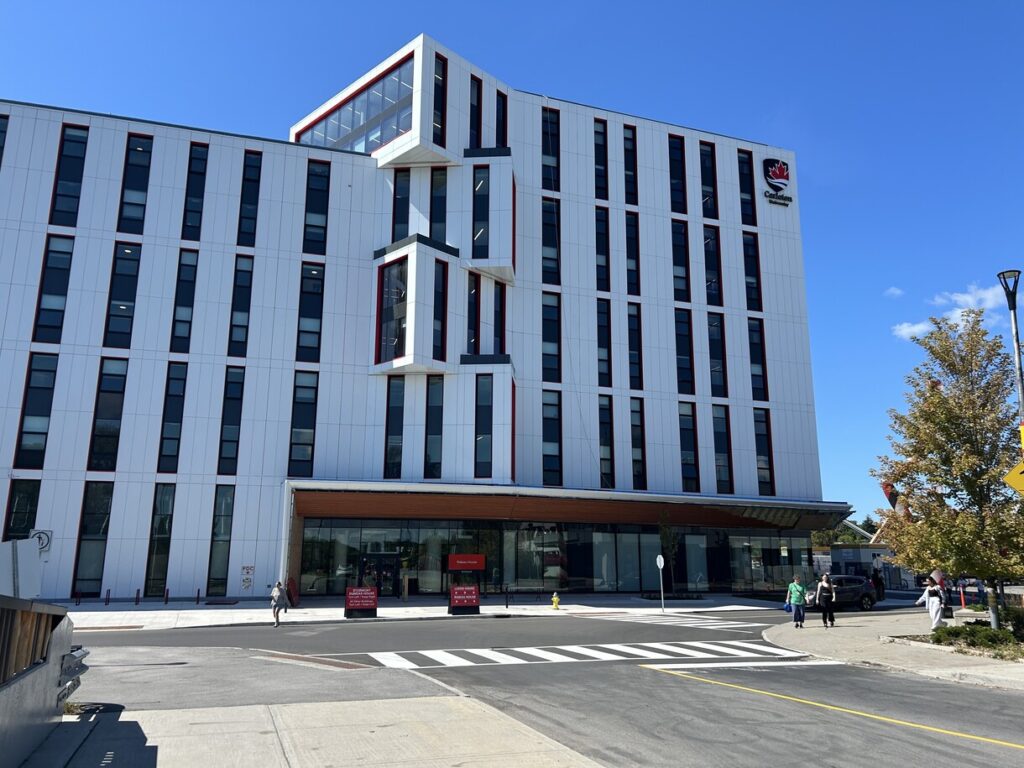 Big building with a sign that says Carleton University. 