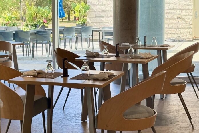 Chairs and tables set up in a restaurant.