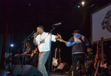 ‘It’s liberating’: The Lionyls debut new EP with supporting local acts at Gladstone Theatre A band performs on a stage.