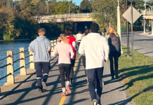 Ottawa students raced to beat the bus — and won a crowd runs on pavement