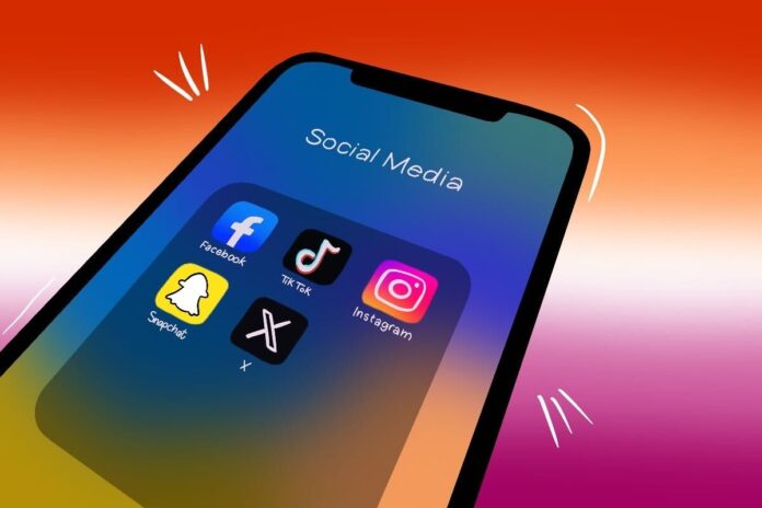 A lesbian flag behind a phone folder called 