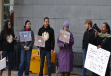 Carleton students rally against Bill 33 on campus Six people stand, holding posters that say "Stop Bill 33" and "PIRG says no to Bill 33"