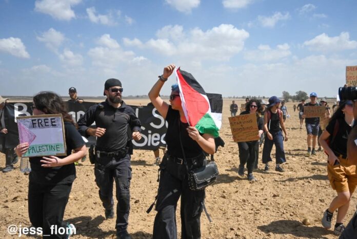 a man with a palestinian flag