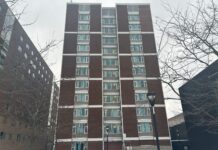 ‘Water was rushing in’: Students relocated after Glengarry House leak, no estimated time of restoration A brick building in front of a cloudy sky.