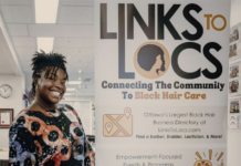 How this Carleton grad is bringing accessible haircare to Ottawa’s Black community Woman in front of a poster that reads "Links and Locs"